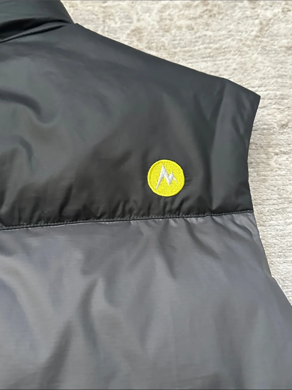 Marmot Men’s Large Gray and Yellow Puffy Down Vest. 700-fill.
